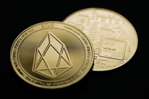 Golden EOS cryptocurrency Stock Photos
