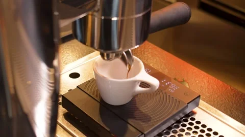 Golden Espresso Shot Pulling into Ceramic Cup on Precision Scale, Third Wave Stock Footage 336033947