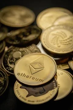 Golden Ethereum cryptocurrency Stock Photos
