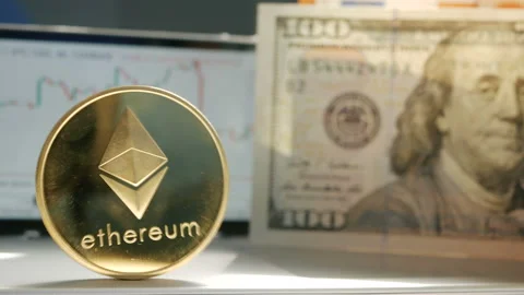 Golden ethereum ETH fluttering on the background of a graphic stock chart Stock Footage 88715919