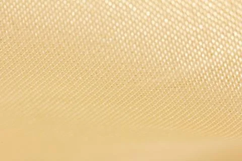 Golden fabric as a background. macro Foto stock