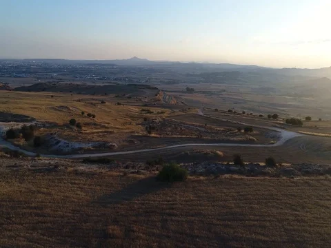 Golden fields tracking over cliff Stock Footage 78561972