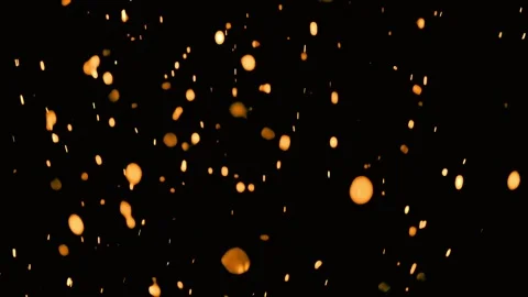 Golden fire bubbles fly on black backgro... | Stock Video | Pond5