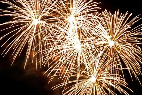 Golden firework bursts Stock Photos