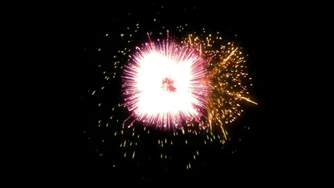 Golden firework explosion isolated on black background for celebration and Stock Footage 344917963