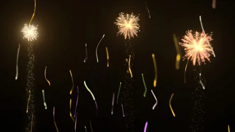 Golden fireworks exploding against dark night sky creating glowing light trails Stock Footage 342119375
