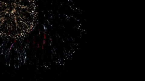 Golden fireworks exploding in a night sky as a festive background 動画素材 326716132
