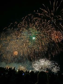 Golden fireworks exploding over crowd at 22 July Cannes Stock Photos