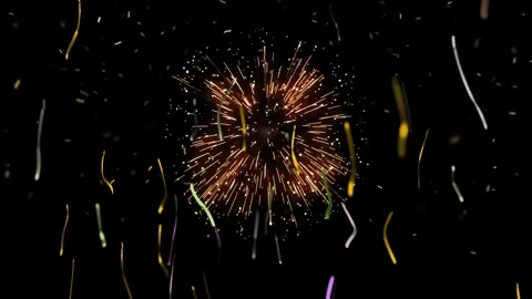 Golden fireworks explosion with falling confetti streamers on a black background Stock Footage 341908050