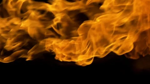 Golden Flames in Motion Capturing Energy and Warmth in Fiery Dance Against .. Stock-Footage 341920362