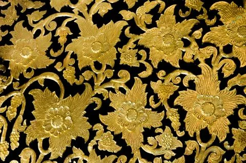 Golden flower of bas-relief  pattern thai style Stock Photos