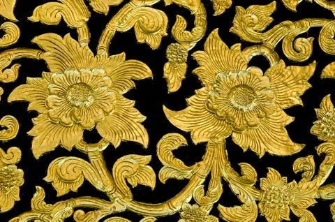 Golden flower of bas-relief  pattern thai style Stock Photos