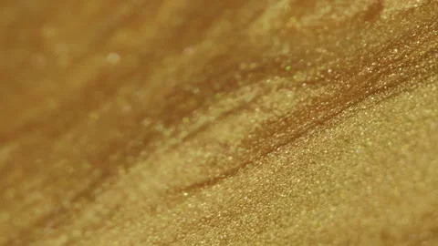 Golden fluid glitter paint wave metallic ink flow Stock Footage 265018982