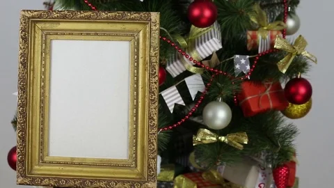 Golden frame on the background of Christmas tree Stock Footage 83299097