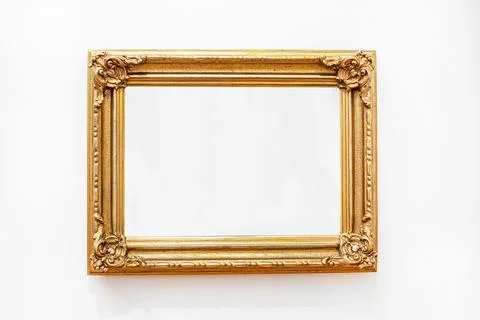 Golden frame profile with plaster elements in the Borocco style on a light .. 写真素材