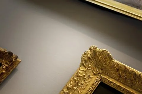 Golden frames in a gallery Stock Photos