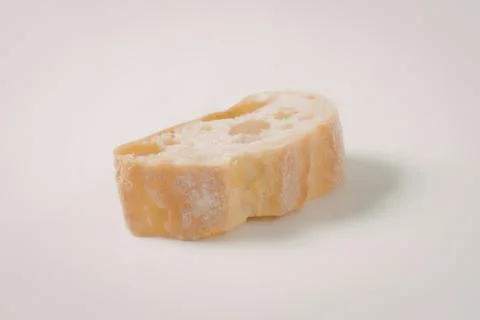 Golden fried bread slice on white background Foto stock