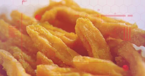 Golden fried strips shifting focus from camera pull, animated red HUD showing Stock Footage 331593381