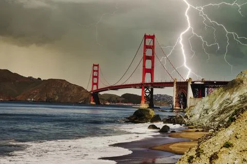 Golden Gate Bridge Against a Dramatic Thunderstorm 写真素材
