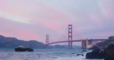 Golden gate bridge by Baker beach with a beautiful sunset Video stock 69257841