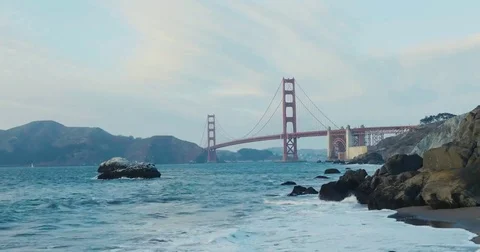 Golden gate bridge by Baker beach with a beautiful sunset Video stock 69262347