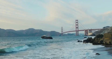 Golden gate bridge by Baker beach with a beautiful sunset Video stock 69262435