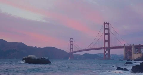 Golden gate bridge by Baker beach with a beautiful sunset Video stock 69265216
