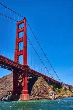 Golden Gate Bridge close up side view on bright sunny day with clear blue skies Stock Photos