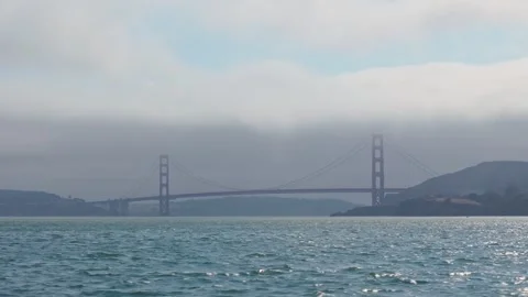 Golden Gate Bridge on a cloudy day as seen from a boat Vídeos de archivo 345055090