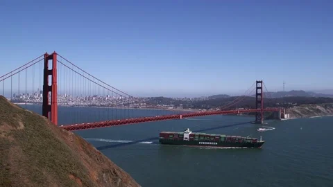 GOLDEN GATE BRIDGE, CONTAINER SHIP PASSES Stock Footage 153480519