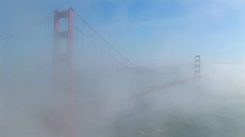 Golden Gate Bridge engulfed in dense fog in San Francisco, California USA Stock Footage 101928454