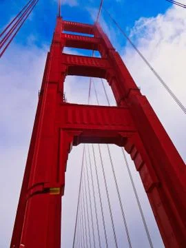 Golden Gate Bridge looking up clouds in background Stock Photos