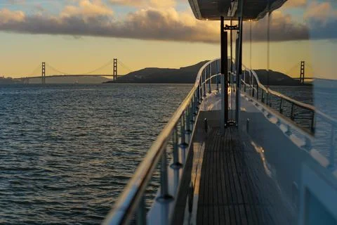 Golden Gate Bridge reflected in window of yacht Stock Photos