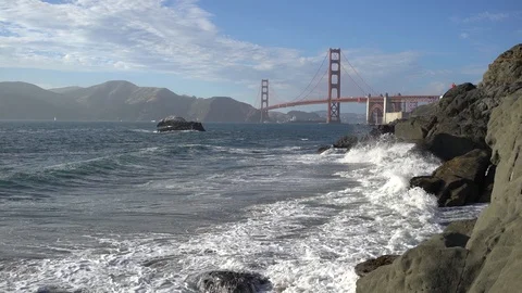 Golden Gate bridge seen from Baker Beach in the city of San Francisco. Видео 89560746