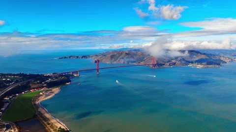 Golden Gate bridge spanning bay with Marin headlands and boat below, San Stock Footage 337461552