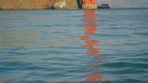 Golden Gate Bridge Support Tower is reflected in the Pacific Ocean, slow motion 스톡 동영상 242831995