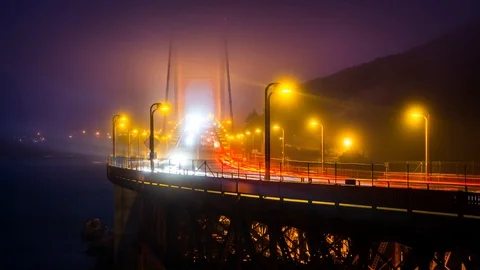 Golden Gate Bridge time lapse at night covered in fog Stock Footage 95391104
