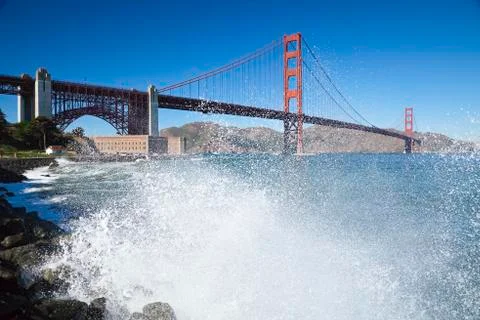 Golden gate bridge with the waves Stock Photos