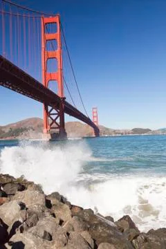 Golden gate bridge with the waves Stock Photos
