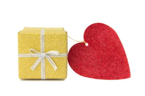 Golden gift box and red heart shaped card Stock Photos