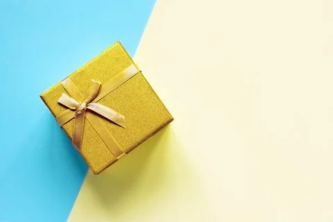 Golden gift box Stock Photos