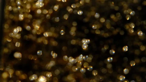 Golden glitter background in slow motion Stock Footage 239416405