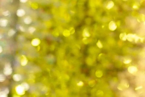 Golden glitter background texture pattern of shiny fabric backdrop effect. 库存照片