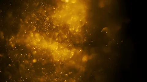 Golden glitter. Beautiful transition real gold particles flying in wind Stock Footage