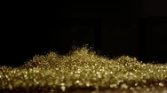 Golden Glitter Dynamic Movements In Slow Motion Stock Footage