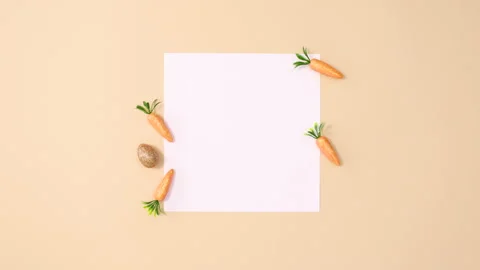 Golden glitter Easter eggs appear around paper card. Stop motion Stock Footage 150274377