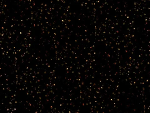 Golden Glitter Particles Background. Abstract Falling Gold Dust on Black Stock Footage 327159453