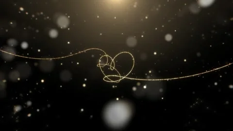 Golden glitter particles background. Abstract magic dust trail with glowing Video stock 339755602