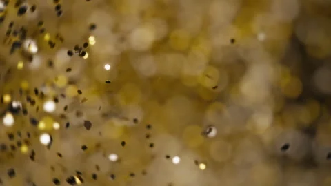 Golden glitter particles exploding in the air Stock Footage 293101199