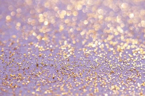 Golden glitter sparkles dust background Stock Photos